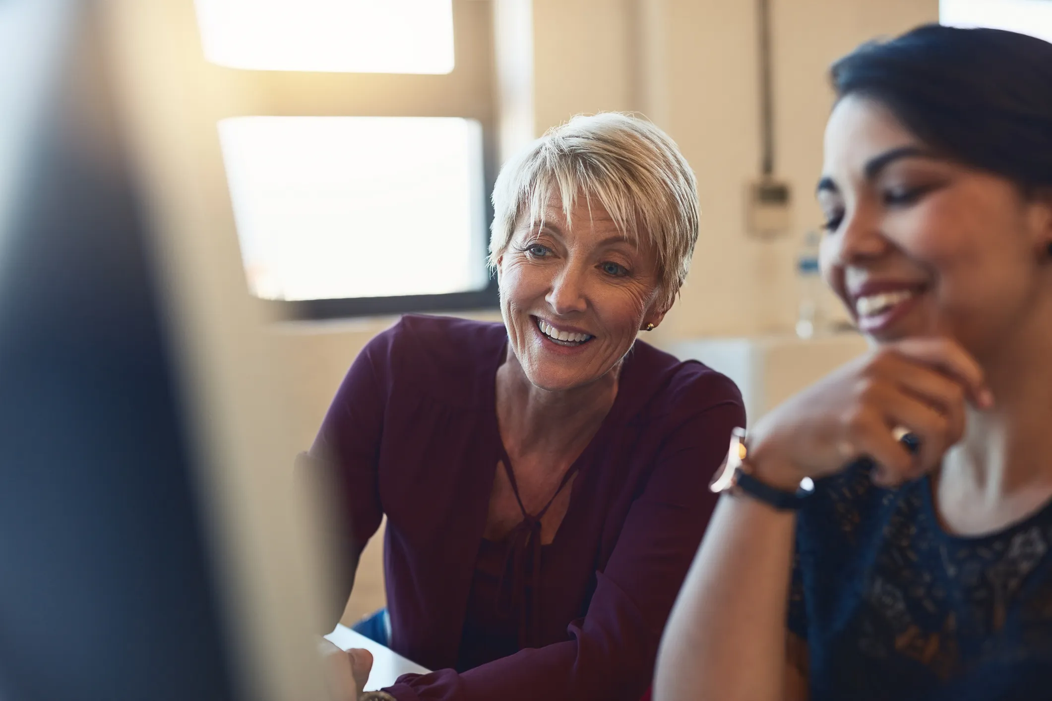Shot of two designers working together on a computer in an office
