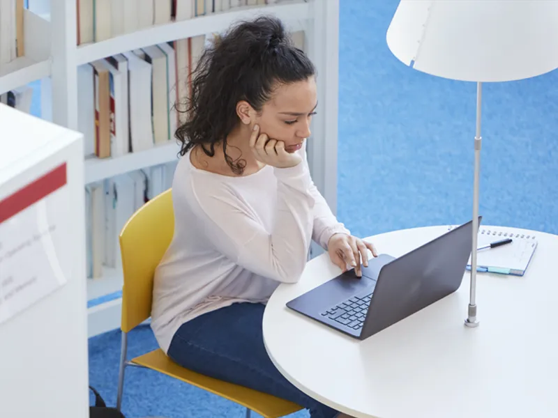 Student looking at laptop